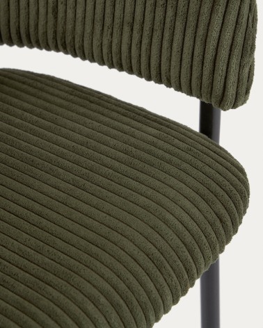 Runnie chair made from dark green wide seam corduroy and steel legs with black finish